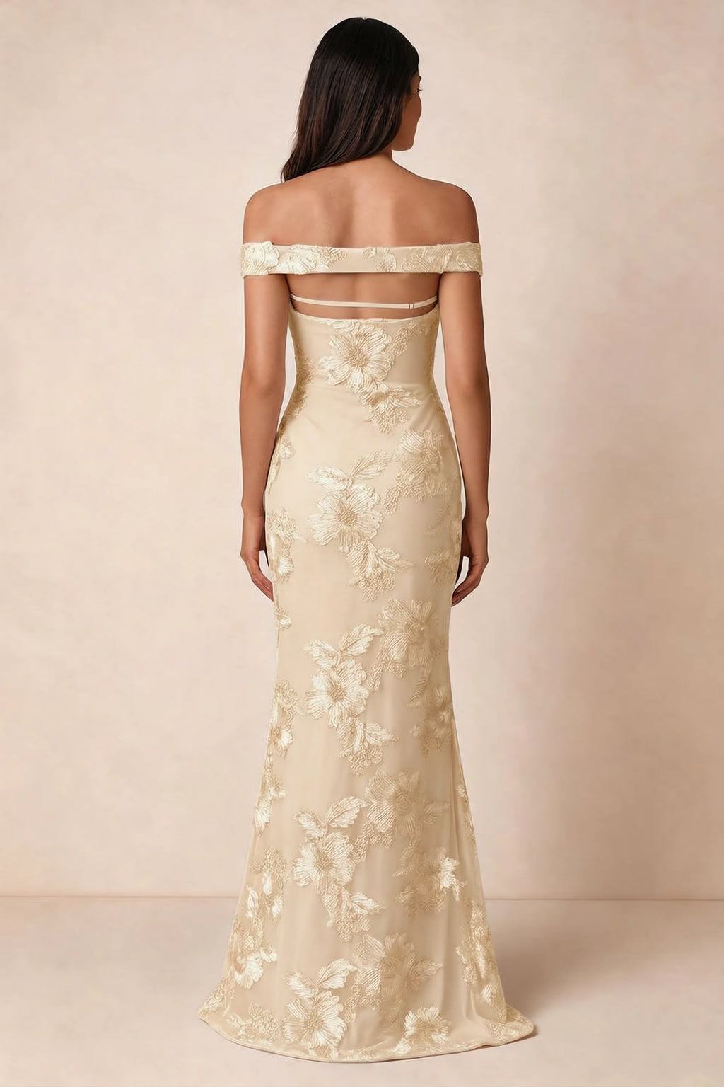 Rear studio view of Bridgette yellow dress showing the horizontal straps across the open upper back