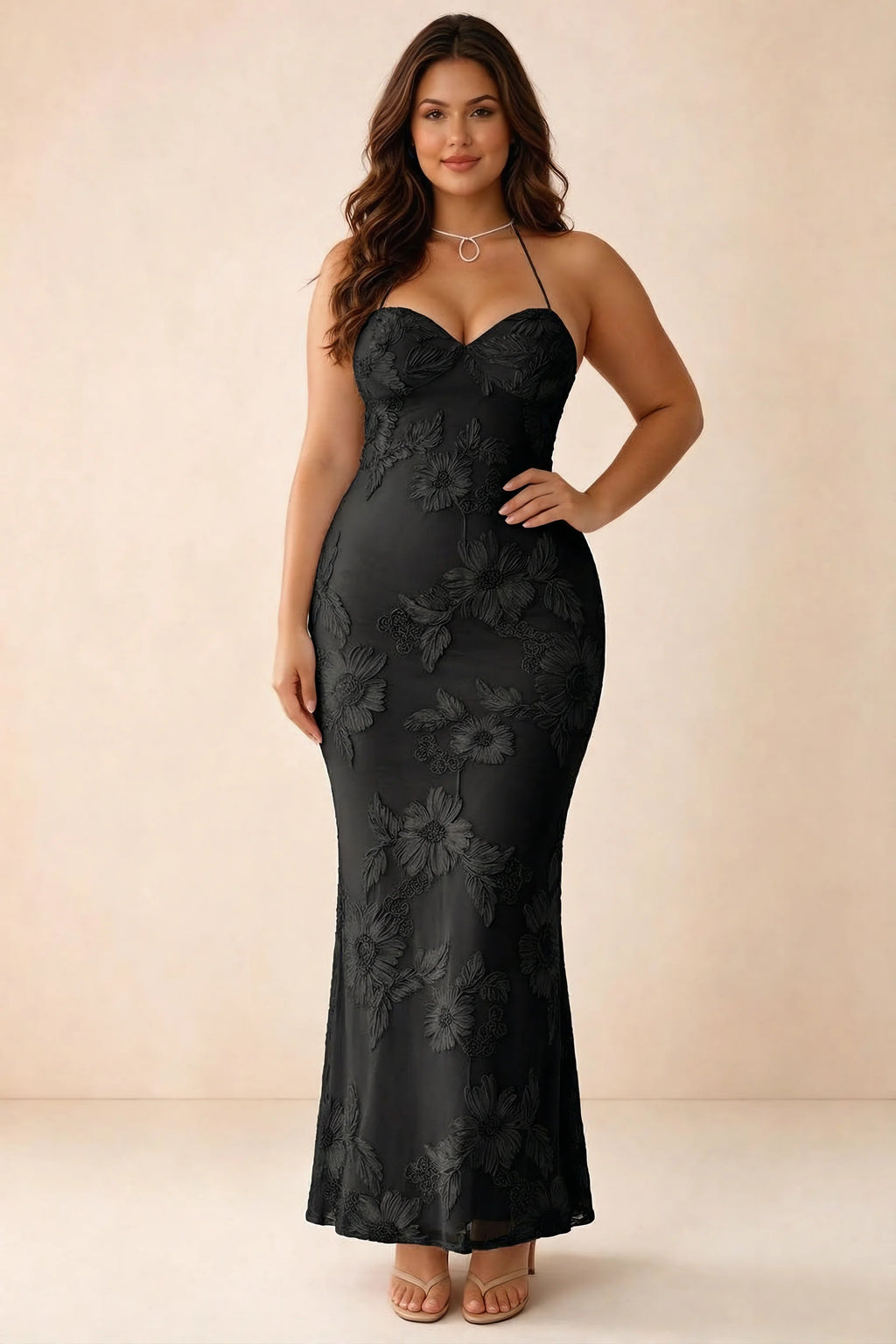Front studio view of Brigitte black dress on a second model, showing the sweetheart floral bodice