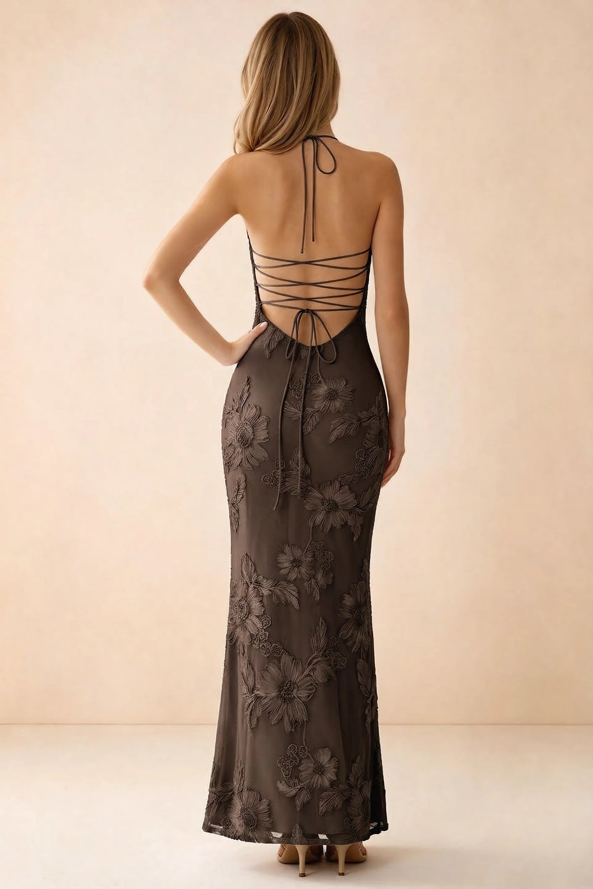 Rear studio view of Brigitte chocolate brown dress showing crossed lacing across the low open back