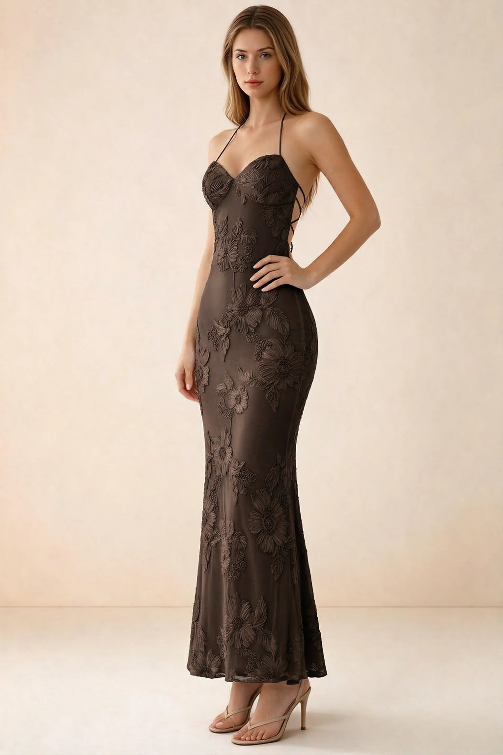Three-quarter studio view of Brigitte chocolate brown dress showing the fitted hips and ankle-skimming hem