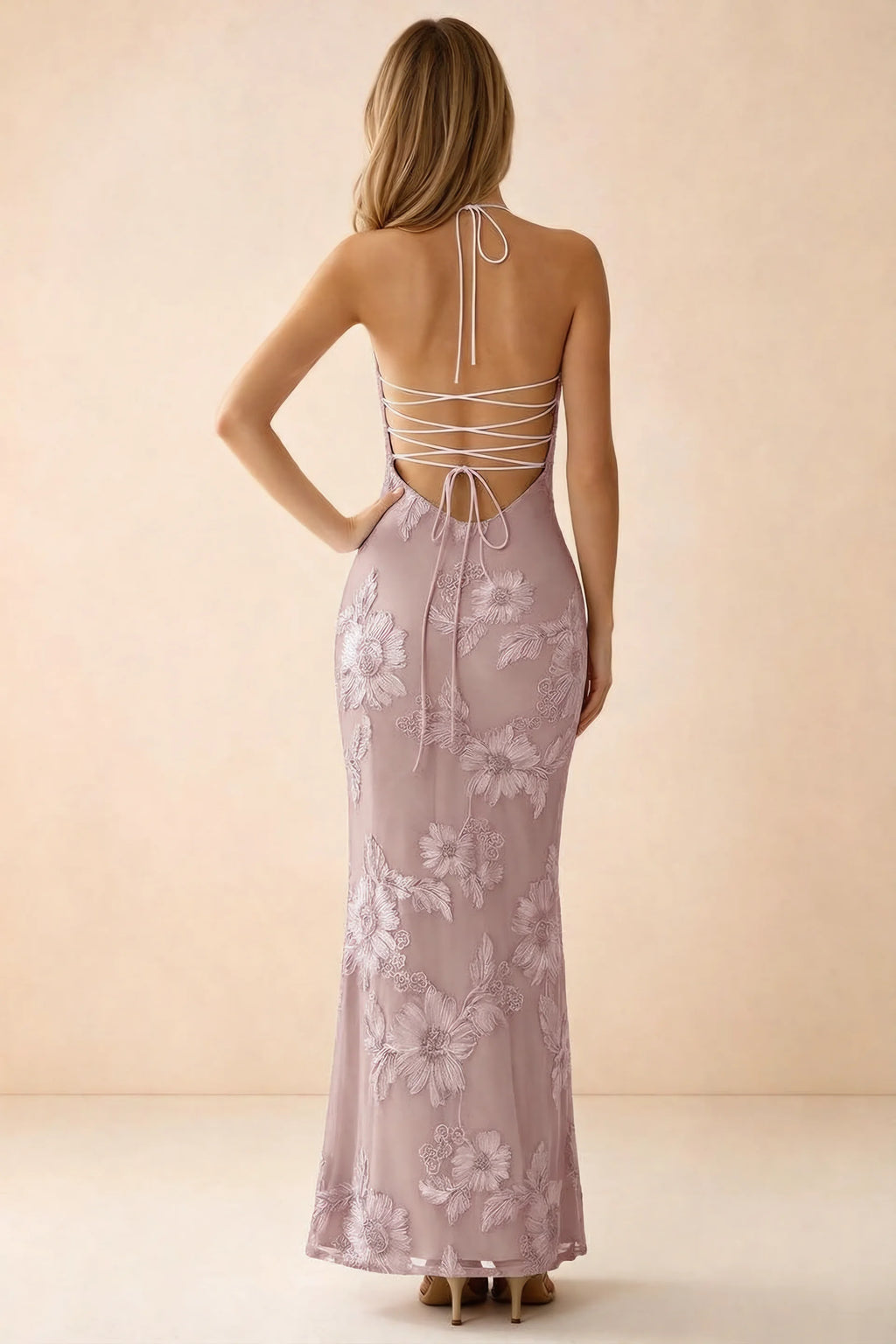 Rear studio view of Brigitte dusty lilac dress showing crossed lacing across the low open back