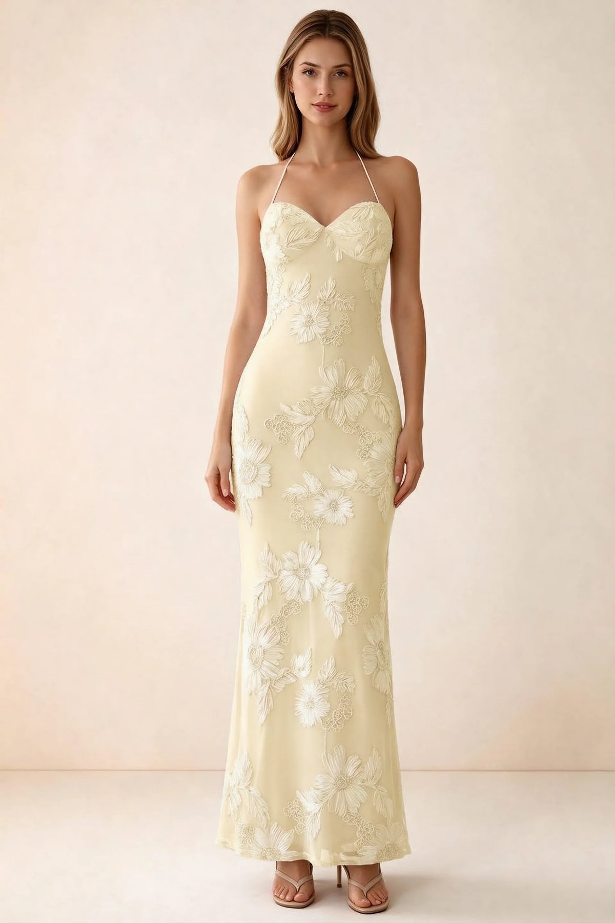 Front studio view of Brigitte lemon floral maxi dress with sweetheart neckline and fine halter ties