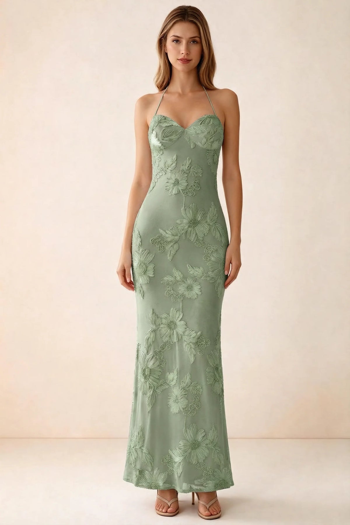 Front studio view of Brigitte sage green floral maxi dress with sweetheart neckline and fine halter ties