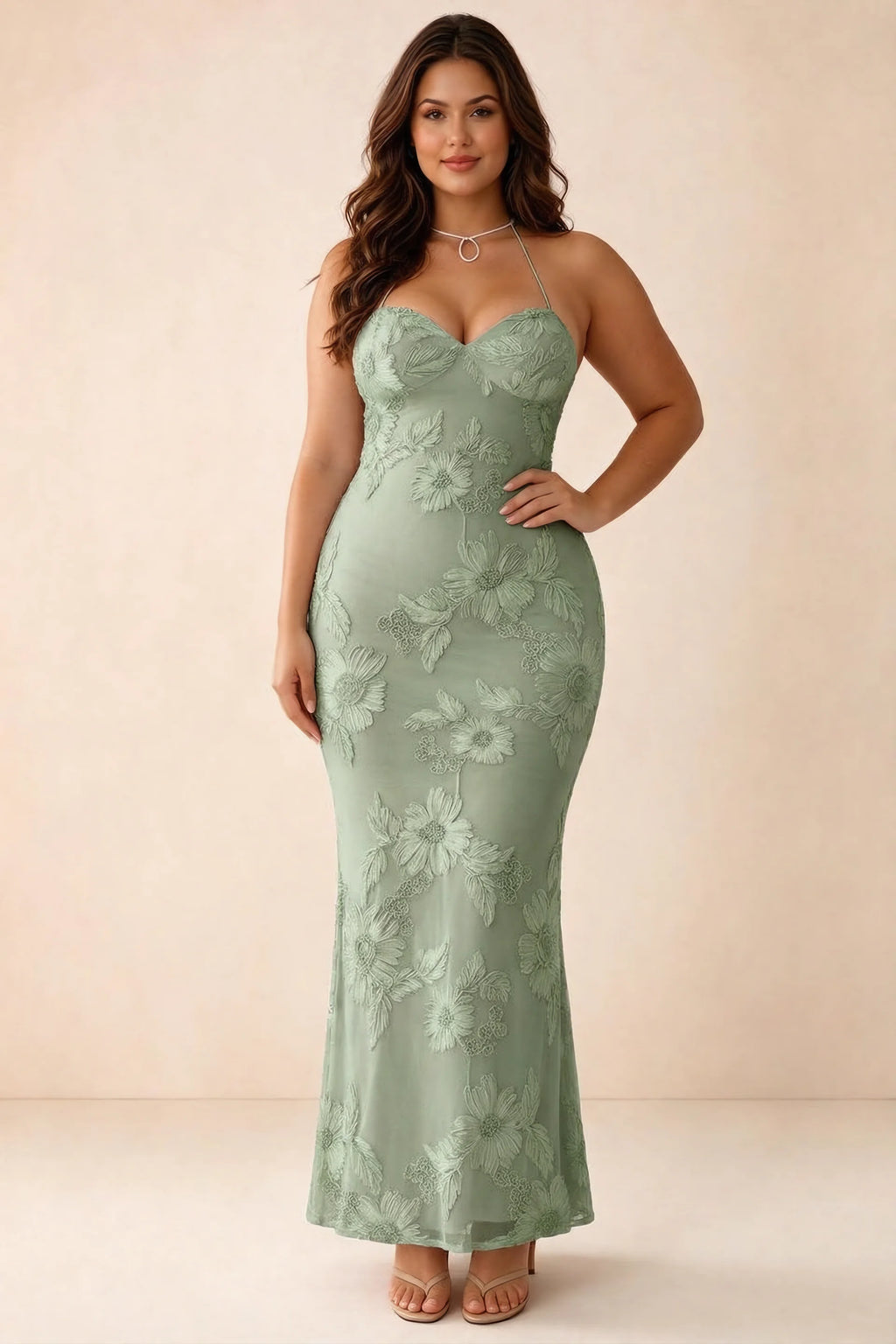 Front studio view of Brigitte sage green dress on a second model, showing the sweetheart floral bodice