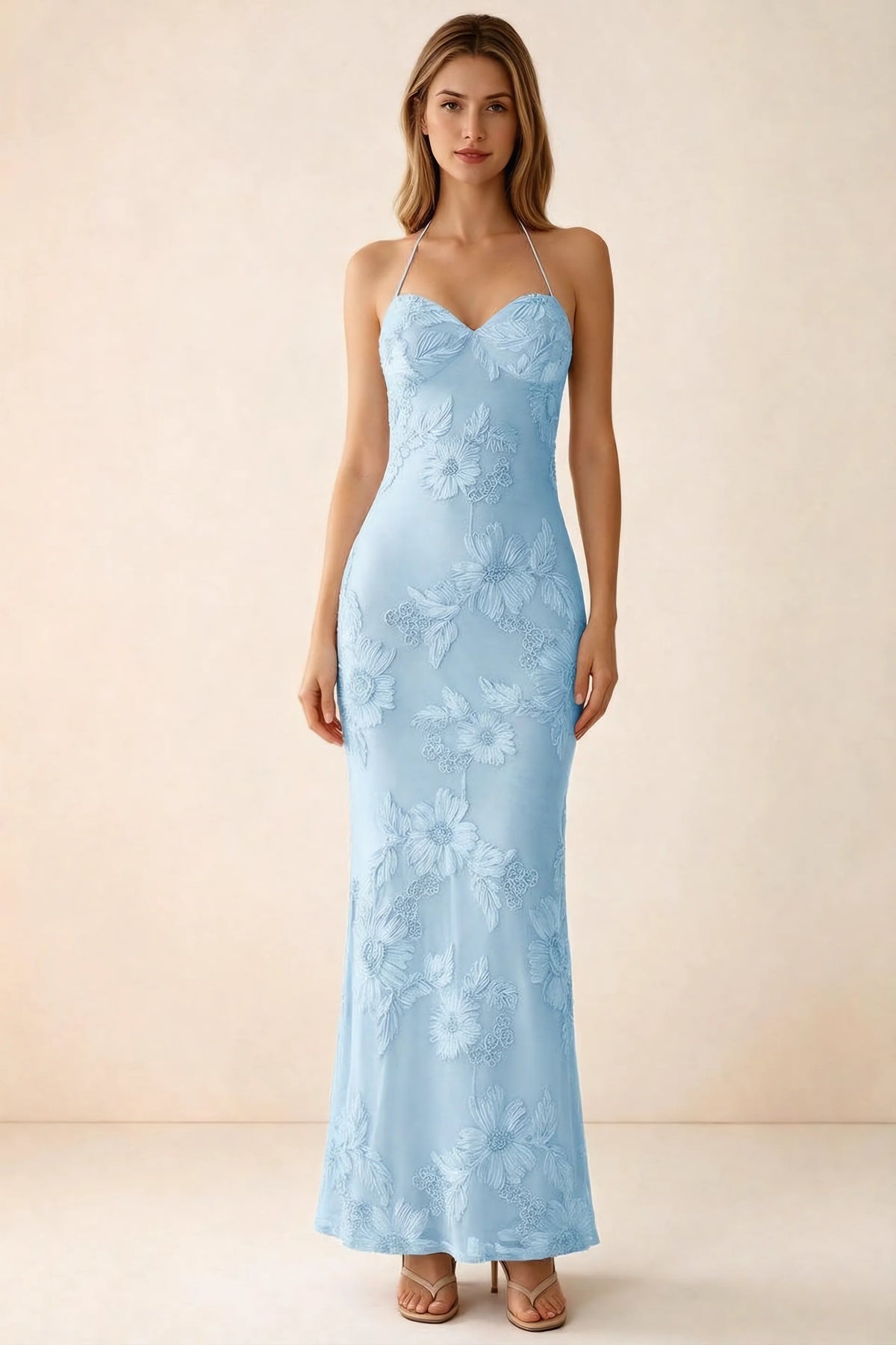 Front studio view of Brigitte sky blue floral maxi dress with sweetheart neckline and fine halter ties
