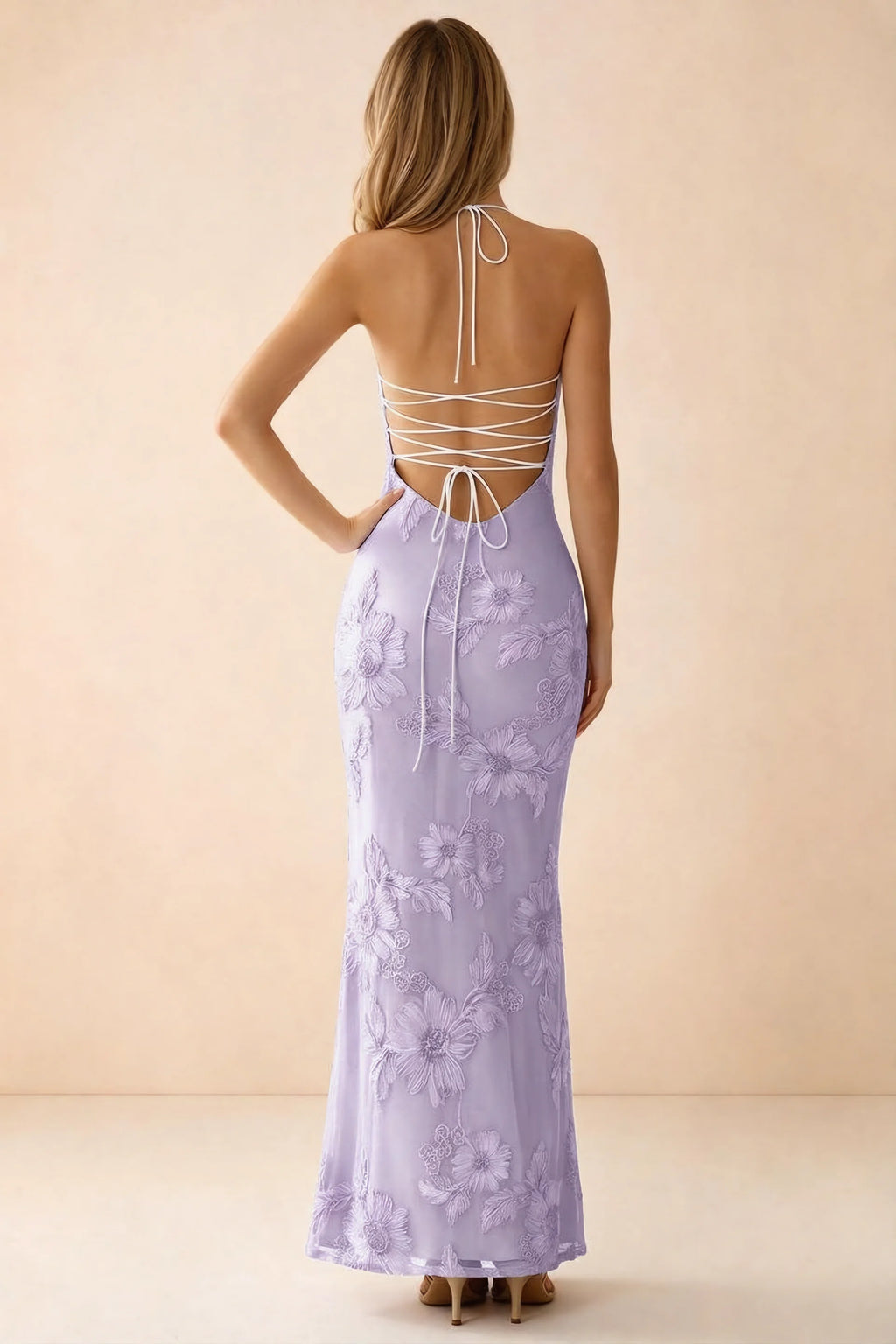 Rear studio view of Brigitte wisteria dress showing crossed lacing across the low open back
