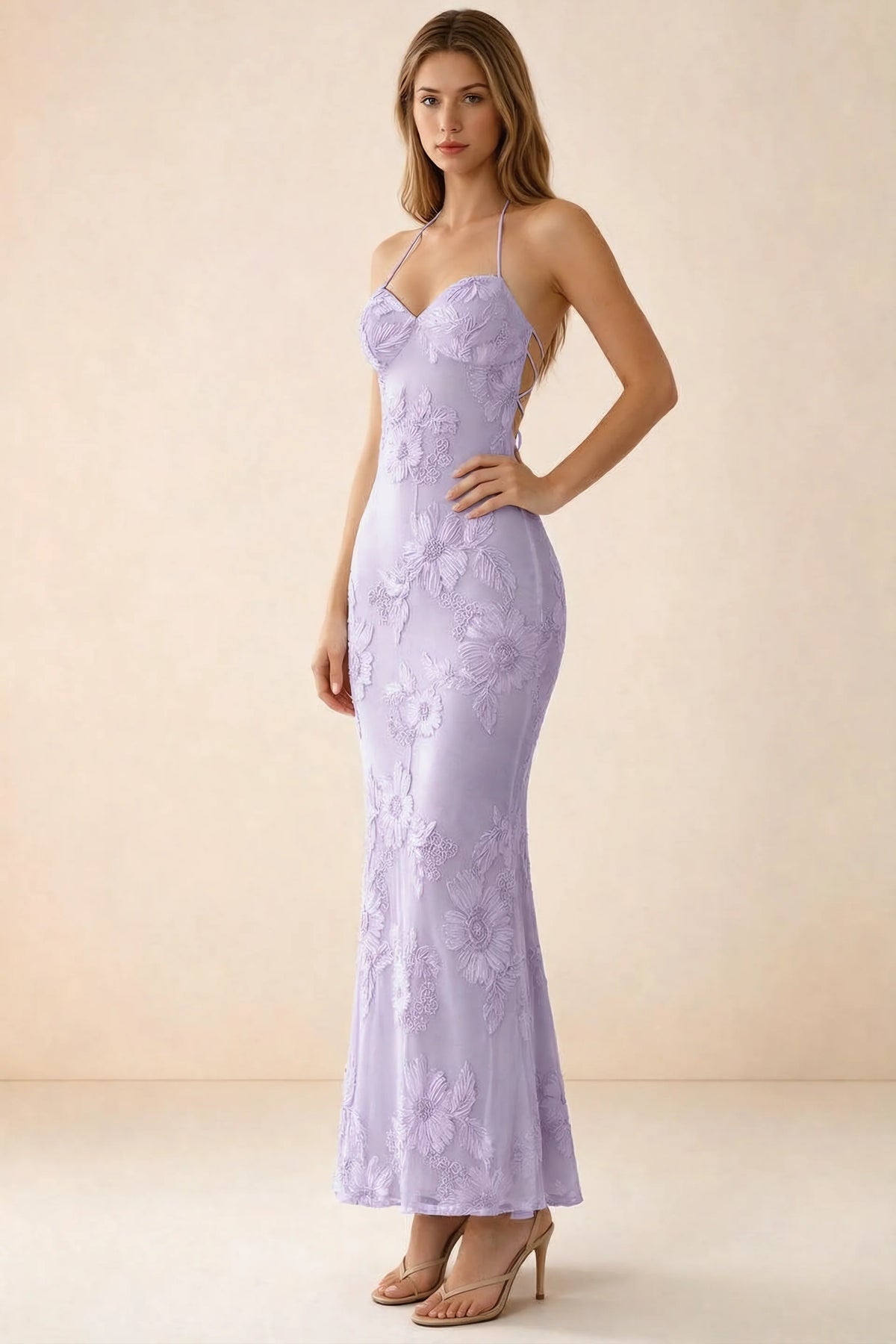Three-quarter studio view of Brigitte wisteria dress showing the fitted hips and ankle-skimming hem