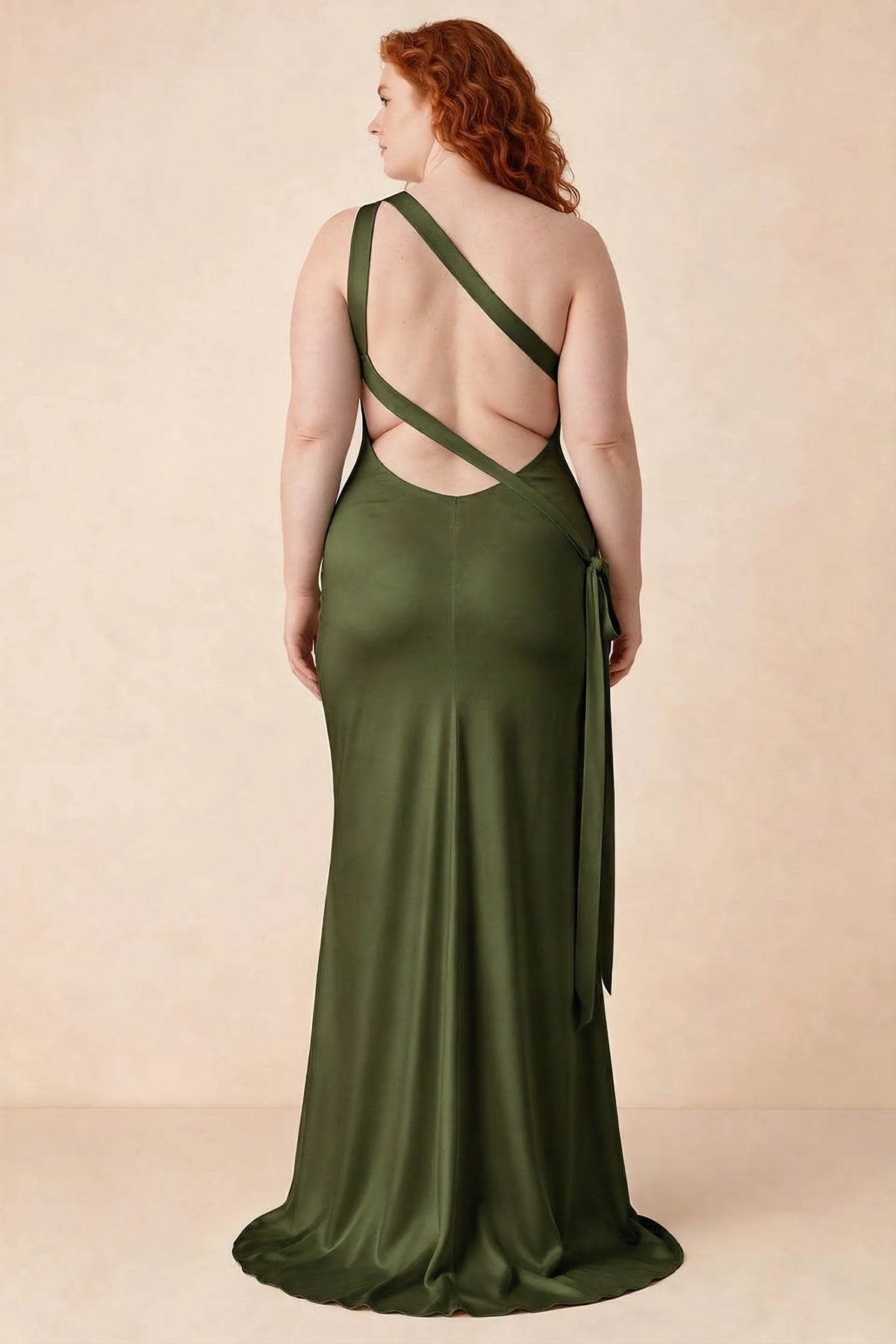Rear studio view of Brittany olive dress on a second model, showing the crossing straps and flared hem
