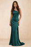Front studio view of Brittany peacock one-shoulder maxi dress with fitted waist and mermaid hem