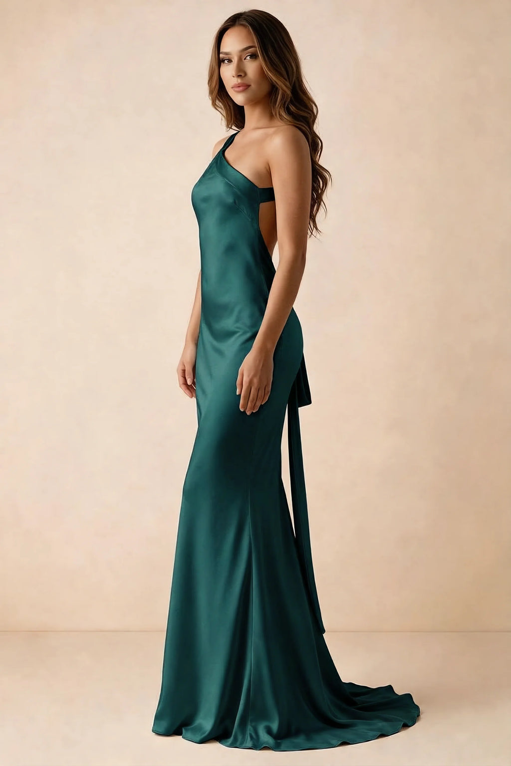 Side studio view of Brittany peacock dress showing the flared skirt and side-back tie