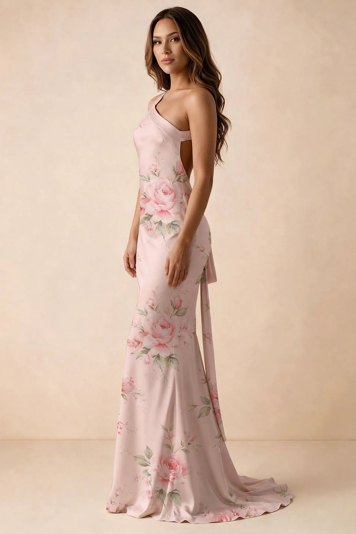 Side studio view of Brittany pink floral dress showing the flared skirt and side-back tie