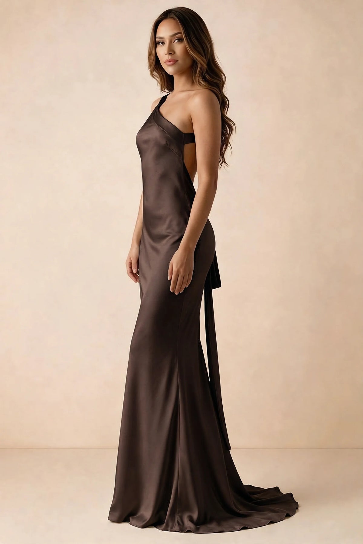 Side studio view of Brittany truffle dress showing the flared skirt and side-back tie