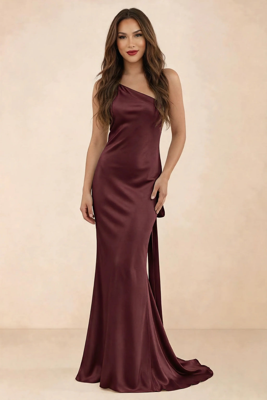 Front studio view of Brittany wine one-shoulder maxi dress with fitted waist and mermaid hem