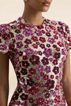 Close up detail of LVLVS Brooke pink floral sequin embroidery high neckline and short cap sleeves, showcasing craftsmanship for party wear