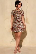 Plus size model wearing LVLVS Brooke red floral sequin embroidery high neck mini dress, elegant semi-formal party attire with short sleeves, inclusive size cocktail dress front view