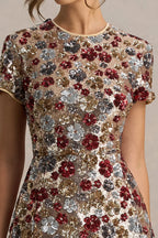 Detailed close up of LVLVS Brooke red floral sequin embroidery pattern, high neck and short cap sleeves craftsmanship, luxury fabric texture for formal party or prom