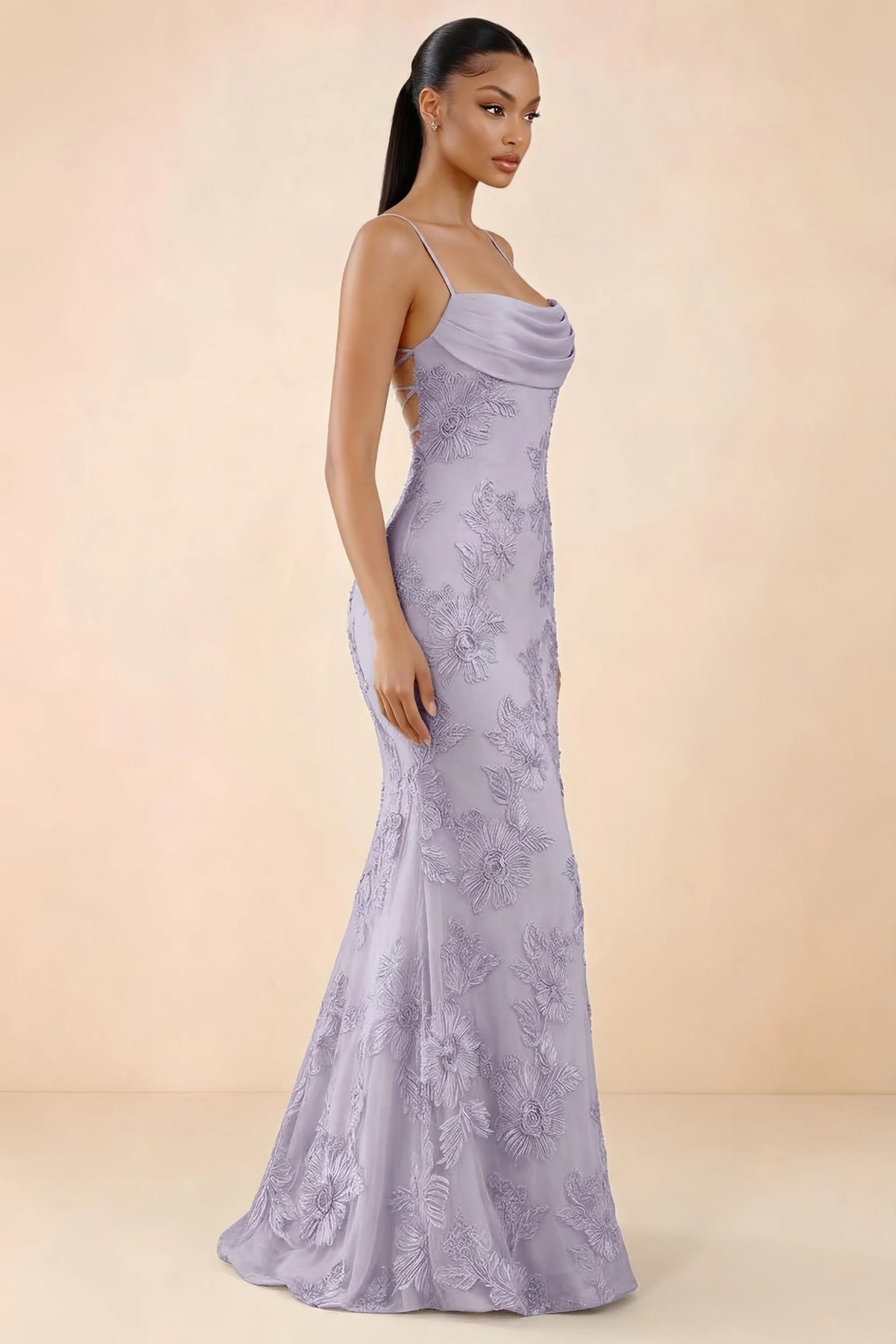 Three-quarter studio view of Brynn dusty lilac dress showing the fitted hips and flared long hem