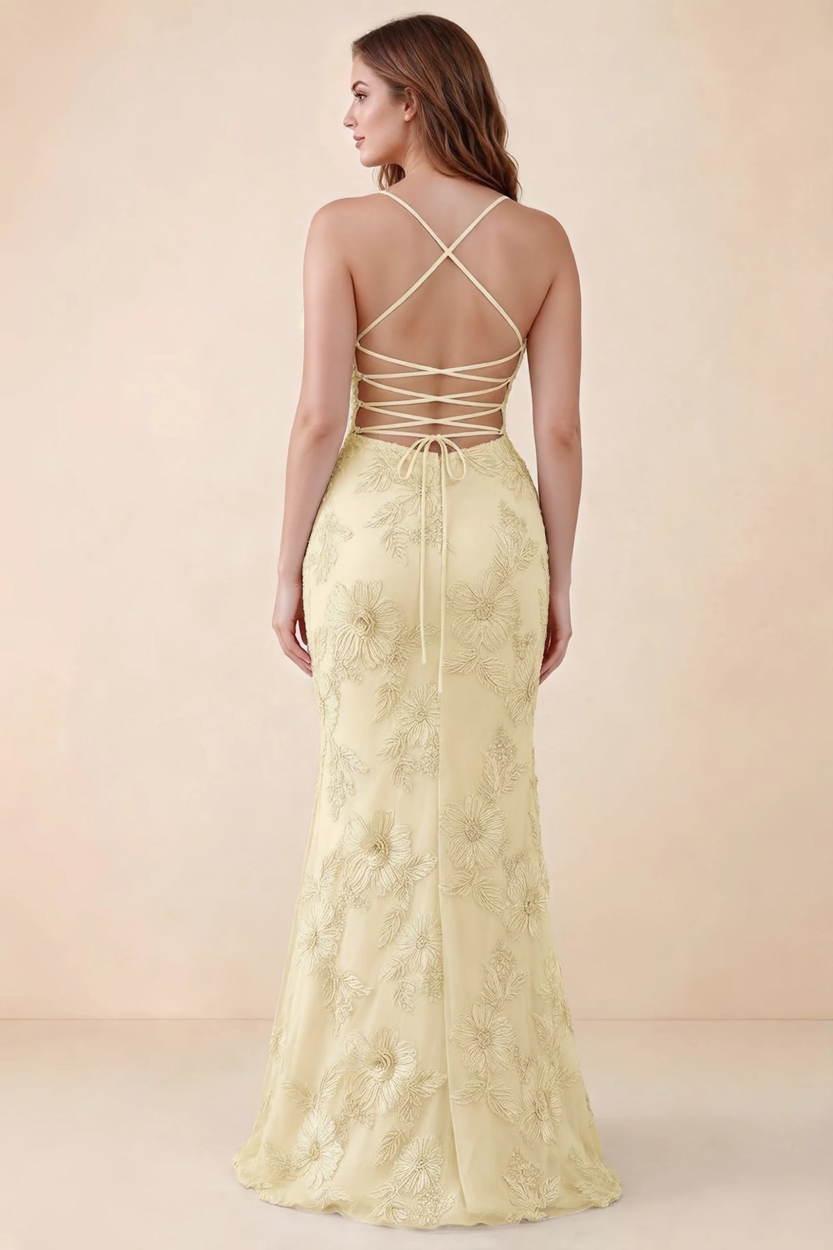 Rear studio view of Brynn lemon dress on a second model, showing the back lacing and floral skirt