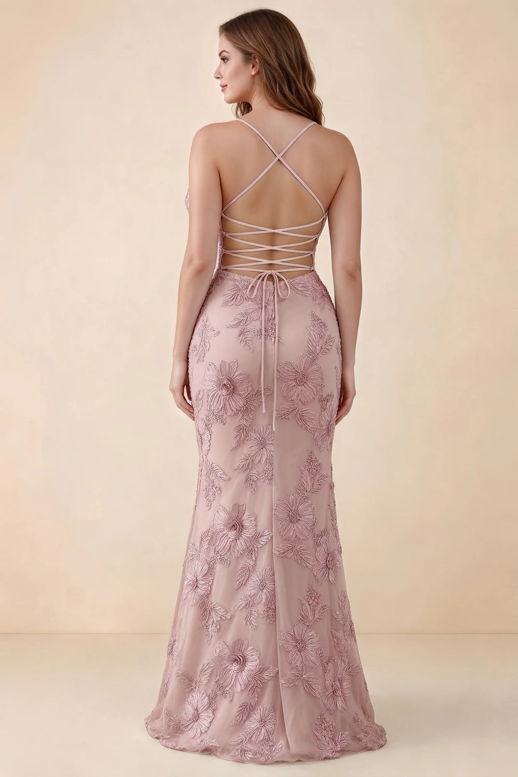 Rear studio view of Brynn pink dress on a second model, showing the back lacing and floral skirt