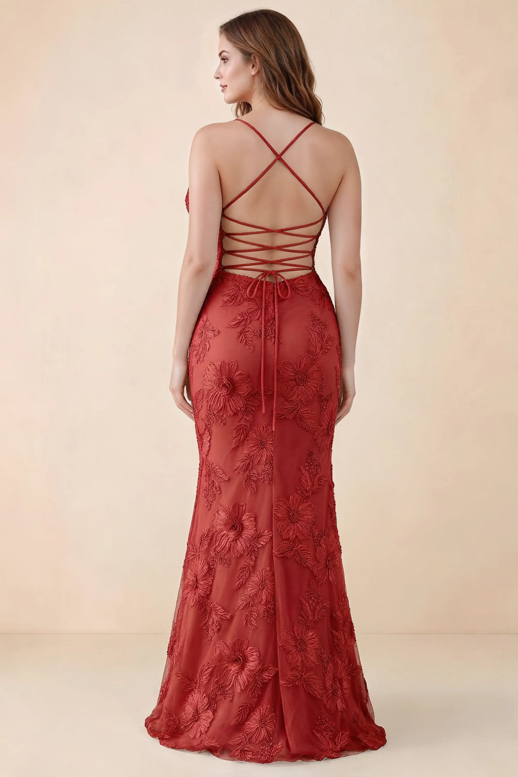 Rear studio view of Brynn red dress on a second model, showing the back lacing and floral skirt