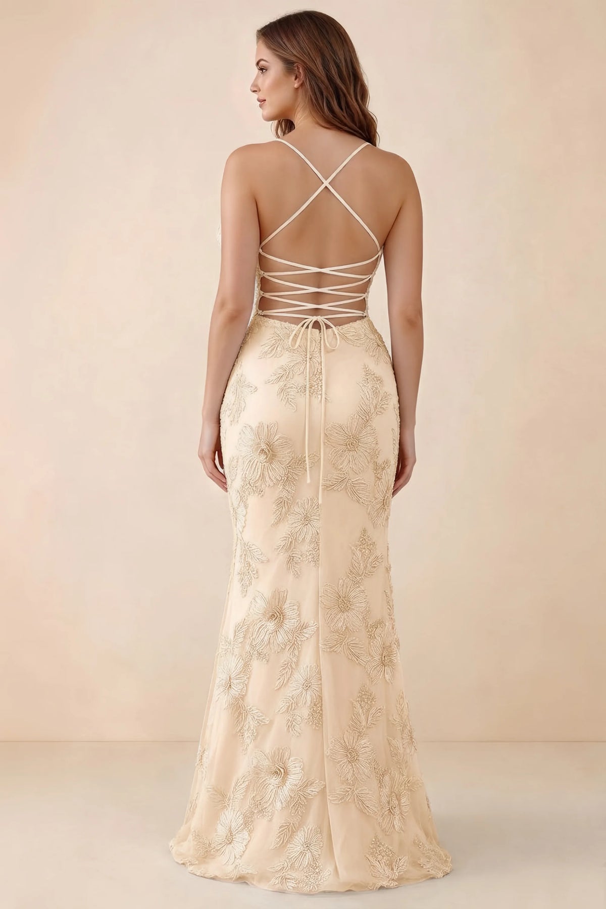 Rear studio view of Brynn yellow dress on a second model, showing the back lacing and floral skirt