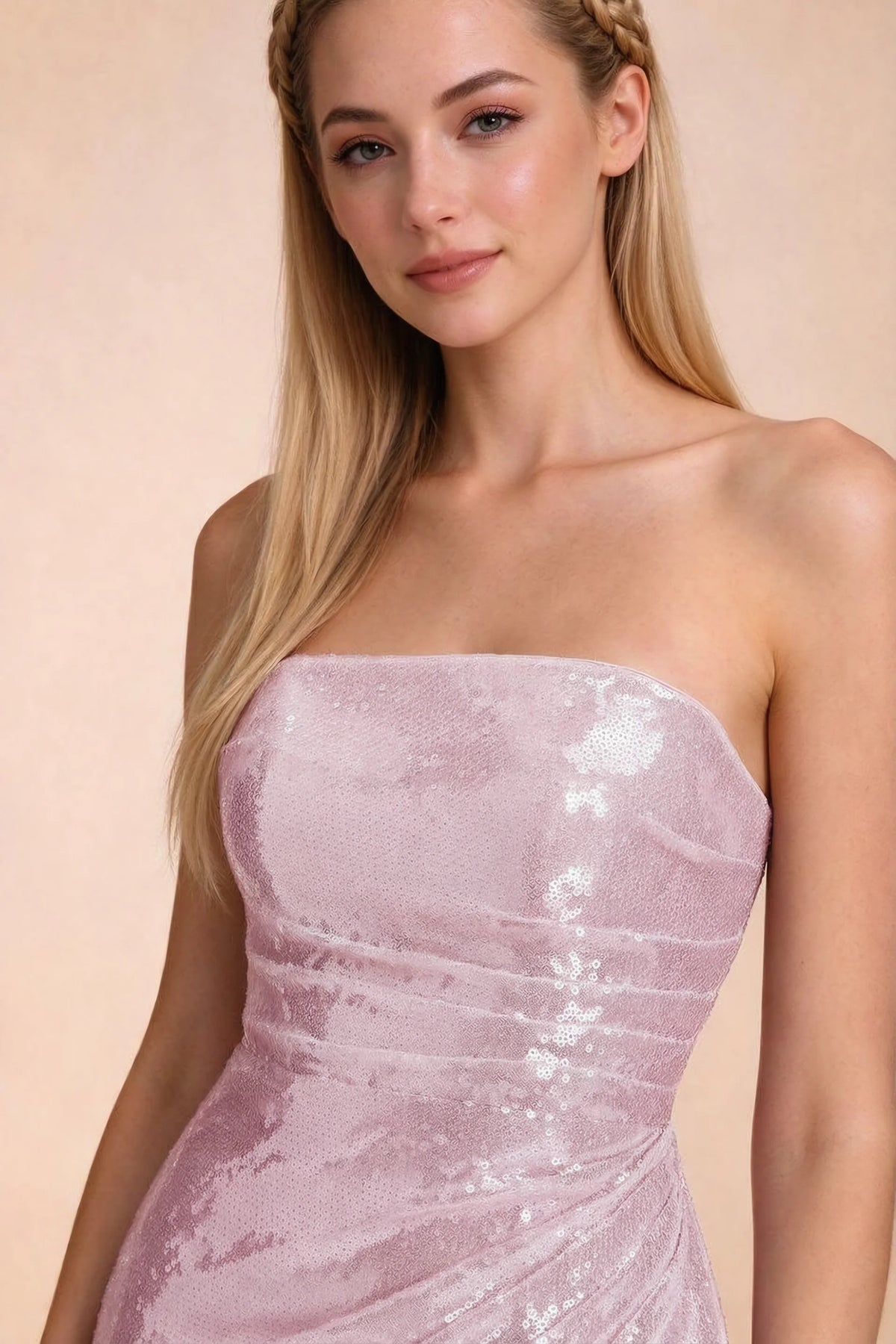 Close-up of Calista dusty pink straight strapless neckline and reflective sequin bodice