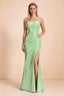 Front studio view of Calista light green strapless sequin maxi dress with diagonal pleats and a high leg opening