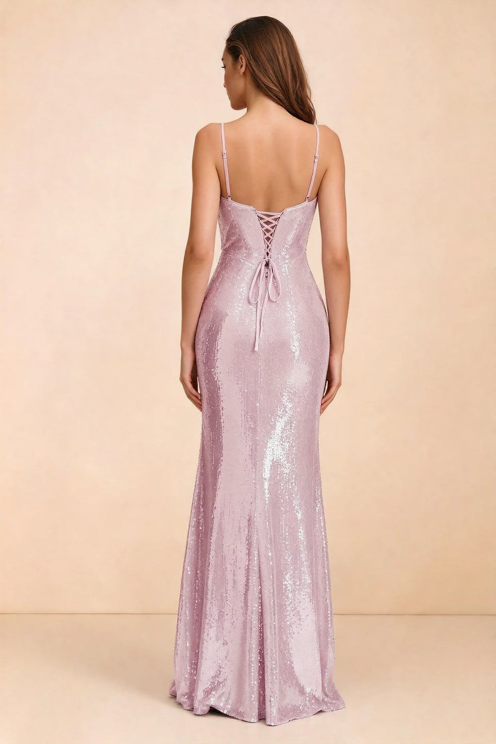 Translation missing: en.Rear three-quarter studio view of Callie dusty pink dress showing the centre-back lacing and mermaid skirt content.product_image_secondary