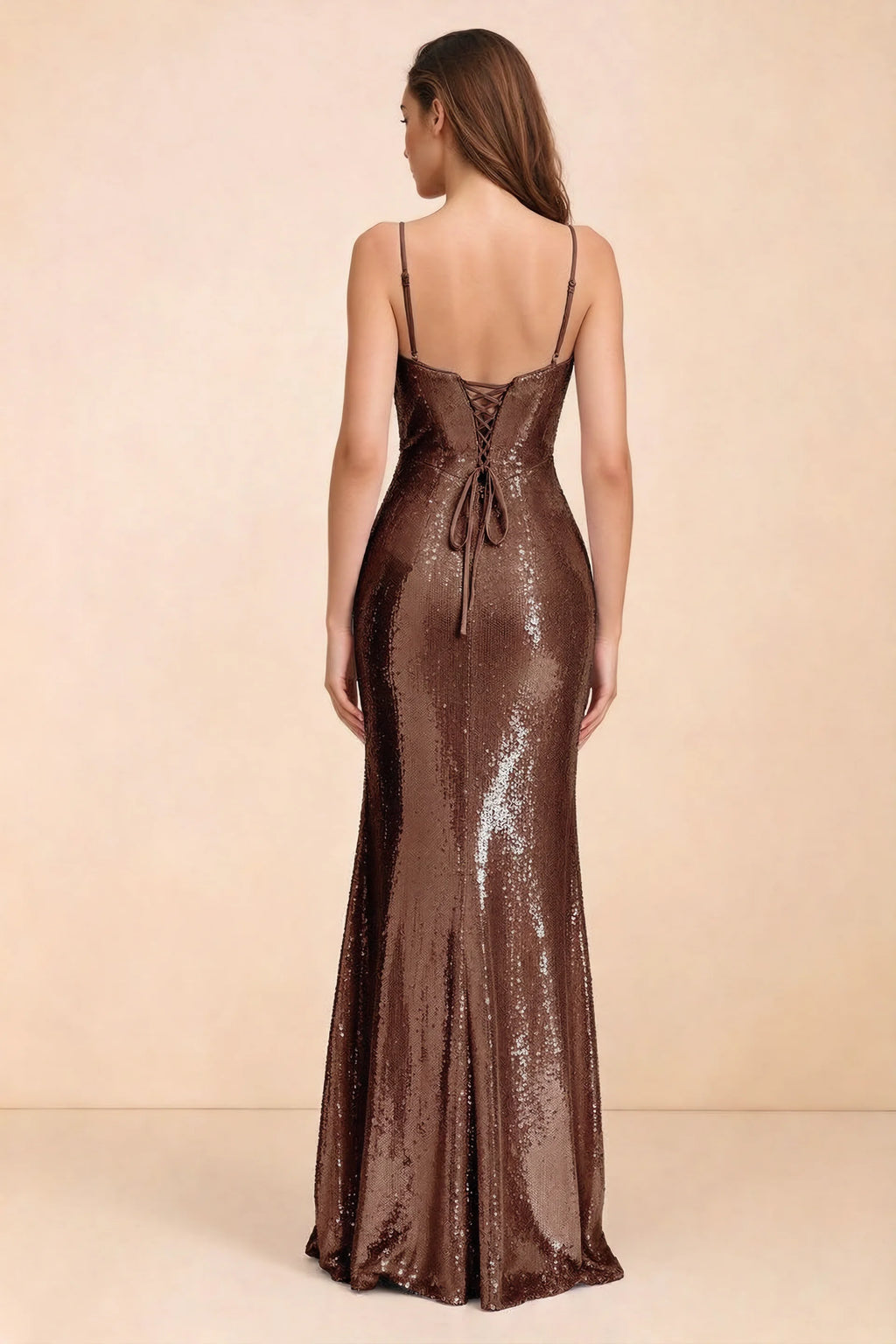Rear three-quarter studio view of Callie mocha dress showing the centre-back lacing and mermaid skirt