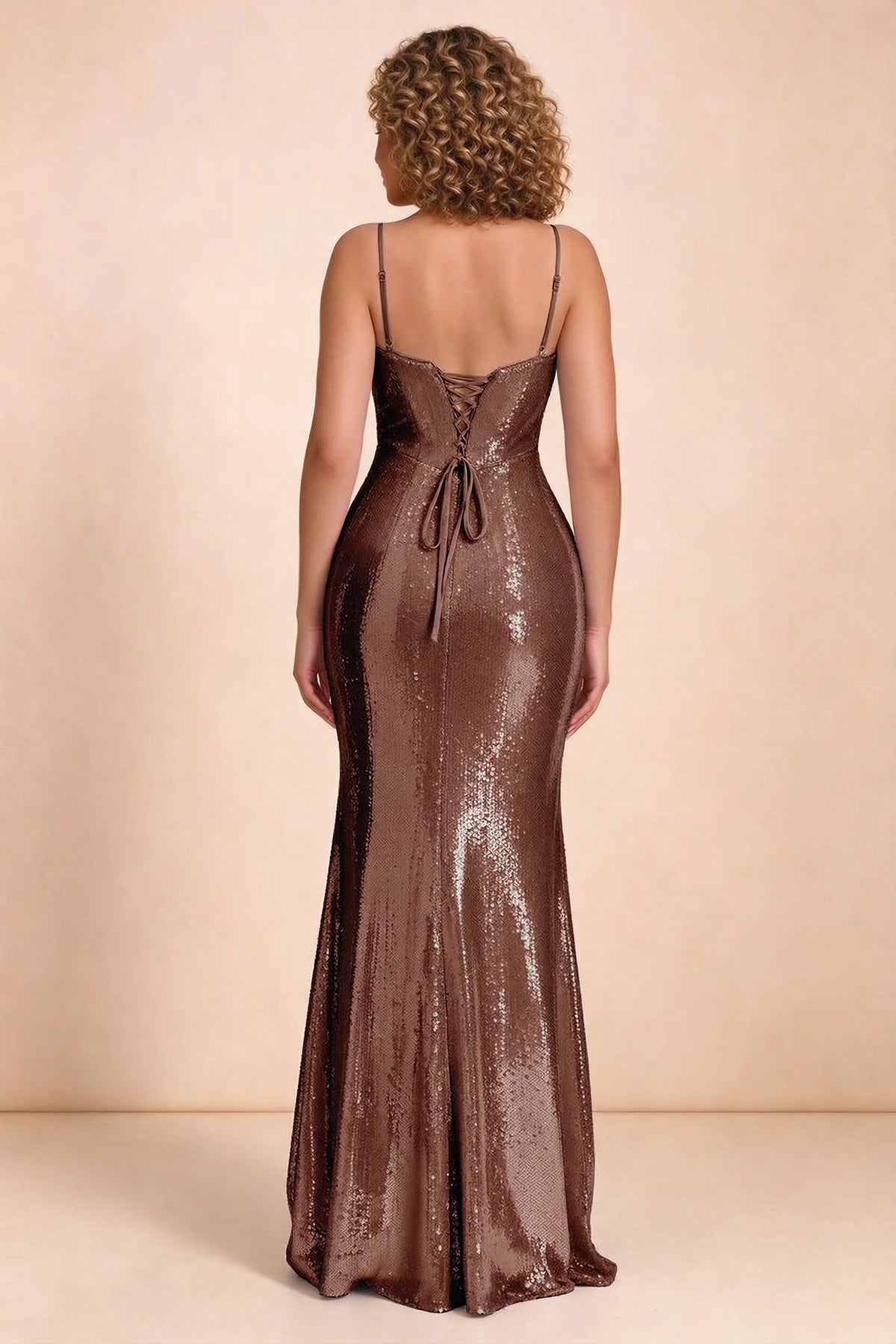 Rear studio view of Callie mocha dress on a second model, showing the back lacing and sequin skirt