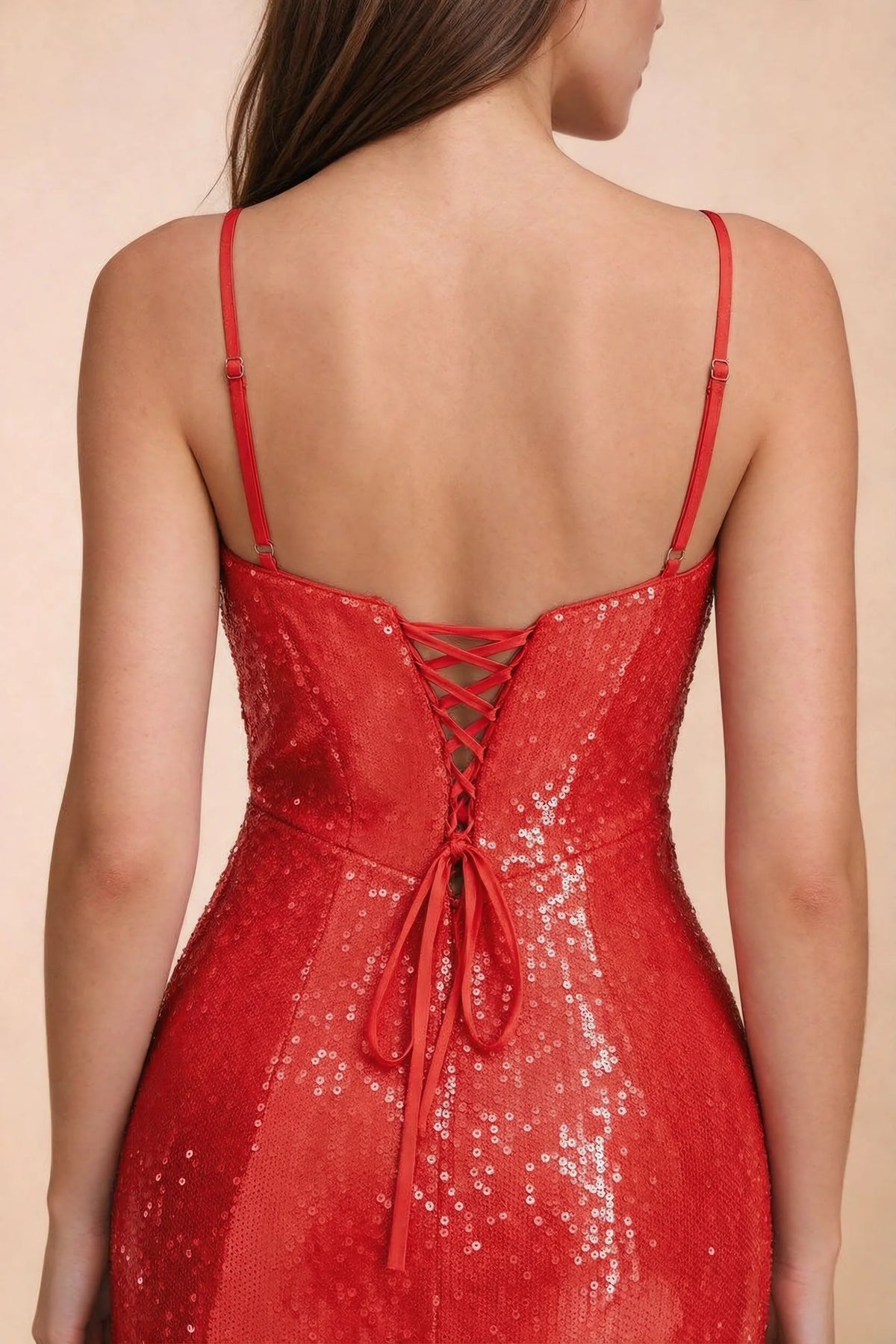 Close-up of Callie red thin shoulder straps and centre-back lacing