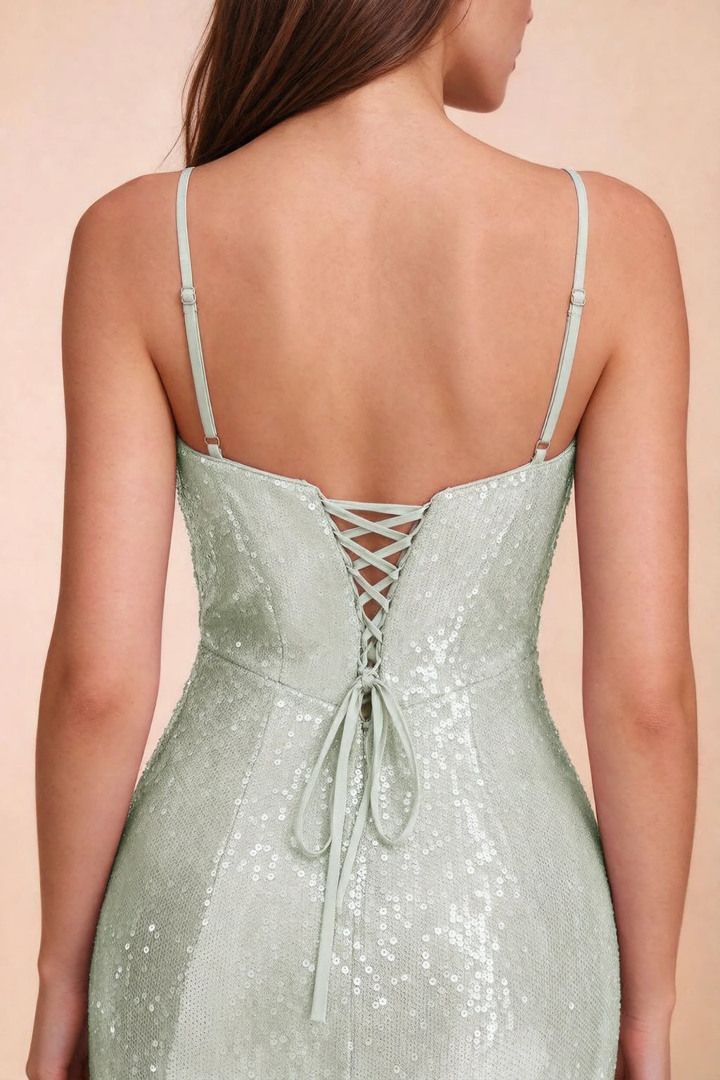 Close-up of Callie sage green thin shoulder straps and centre-back lacing