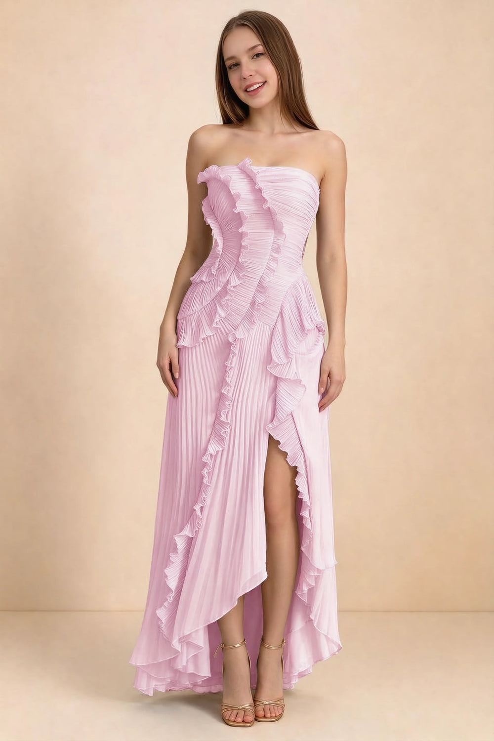 Translation missing: en.Front studio view of Camilla candy strapless maxi dress with pleats, cascading ruffles and an asymmetric opening content.product_image_main