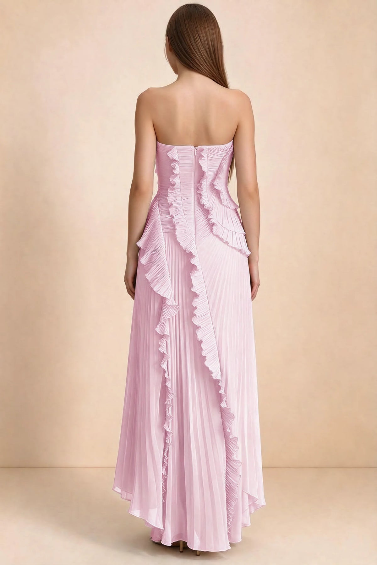 Rear studio view of Camilla candy dress showing curved ruffle layers and a long pleated skirt
