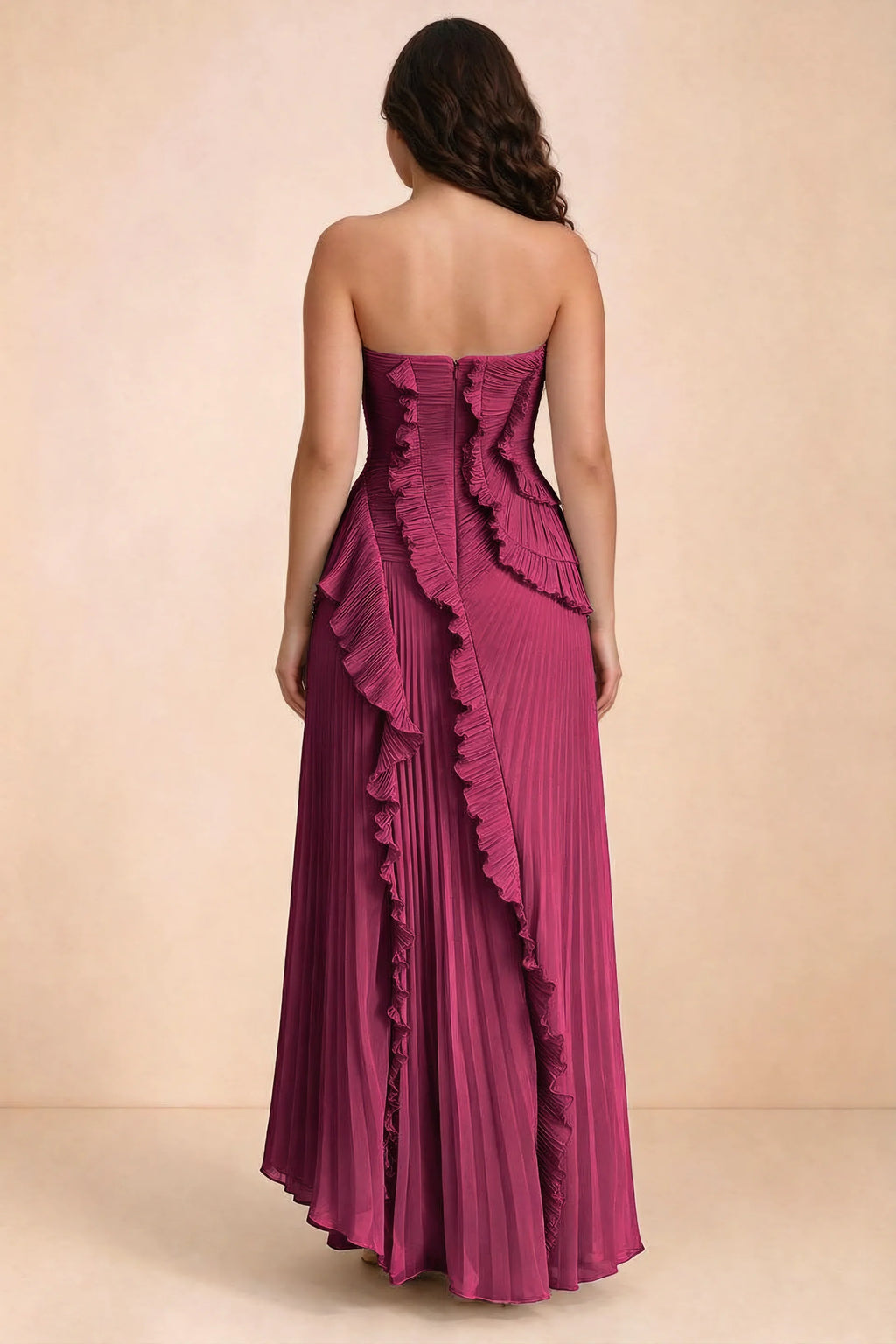 Rear studio view of Camilla merlot dress on a second model, showing the ruffled back and pleated skirt