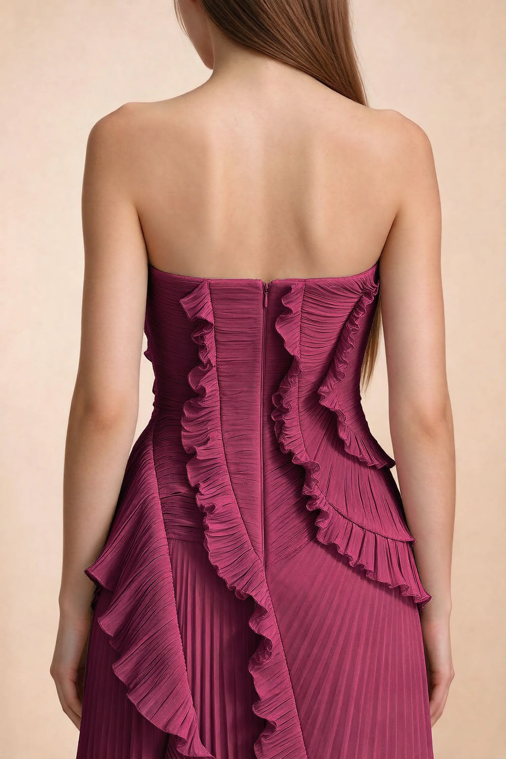 Close-up of Camilla merlot back bodice, centre-back zipper and curved ruffle edges