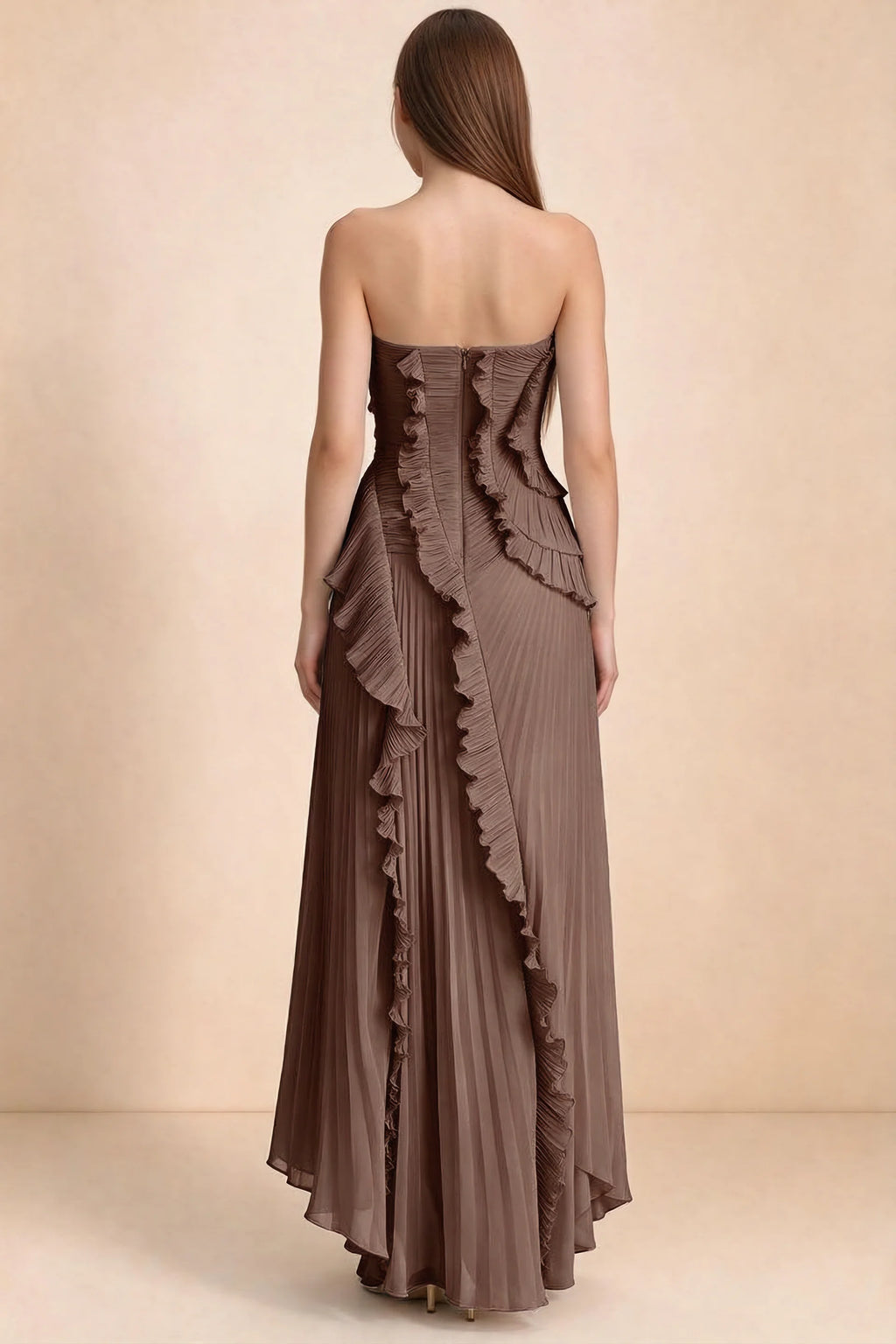Rear studio view of Camilla mocha dress showing curved ruffle layers and a long pleated skirt