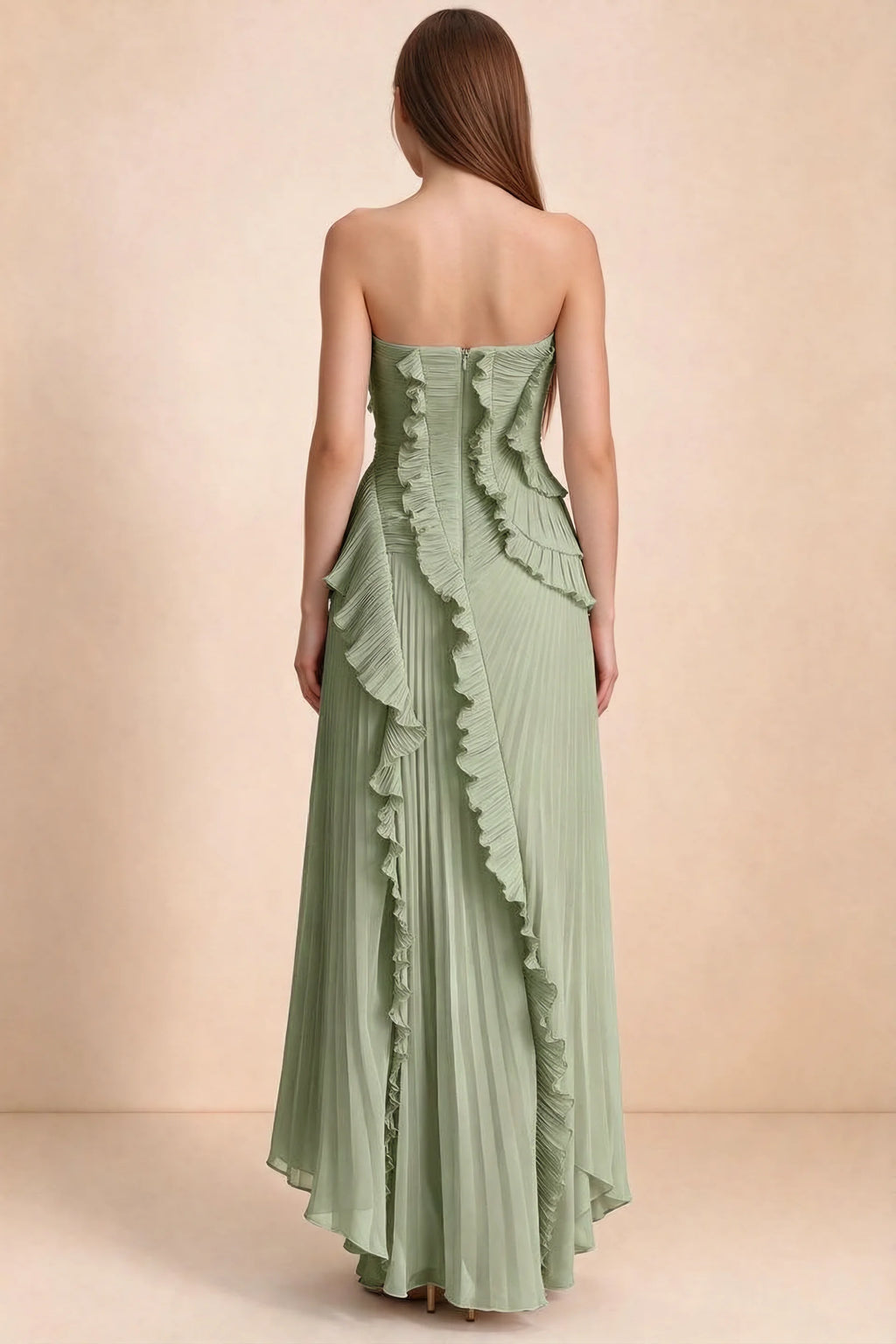 Rear studio view of Camilla pistachio dress showing curved ruffle layers and a long pleated skirt