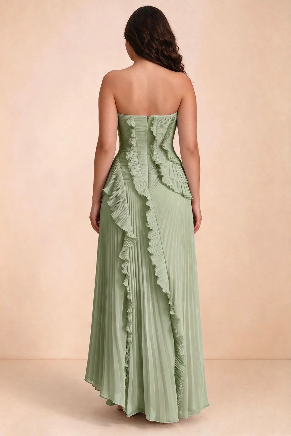 Rear studio view of Camilla pistachio dress on a second model, showing the ruffled back and pleated skirt