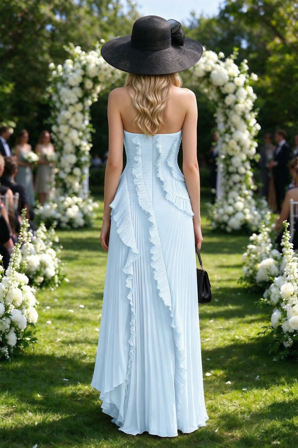 Outdoor rear view of Camilla sky blue dress showing the layered ruffles and long back hem