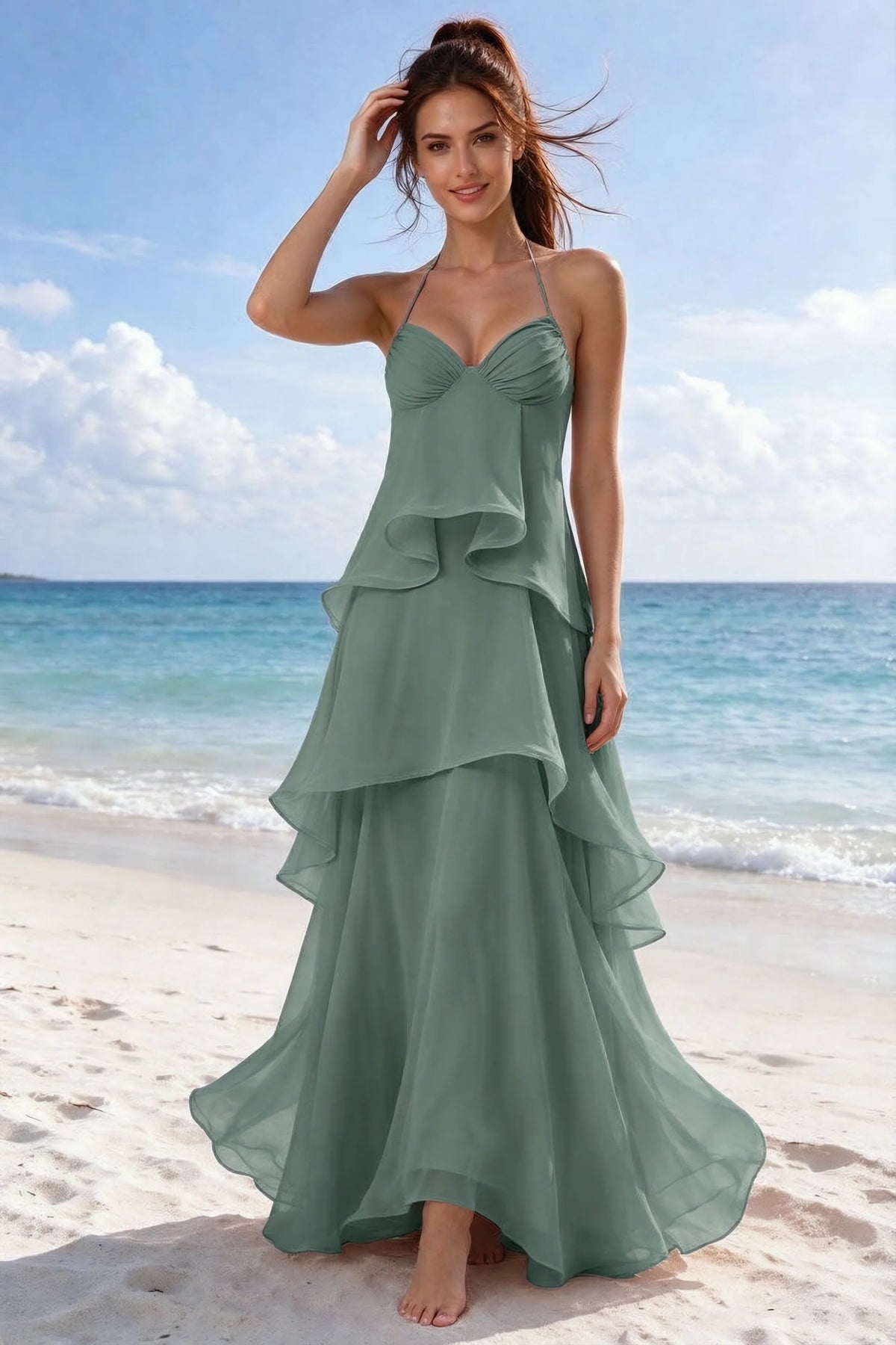 Beachside front view of Candace eucalyptus halter dress showing the flowing ruffles and flared hem