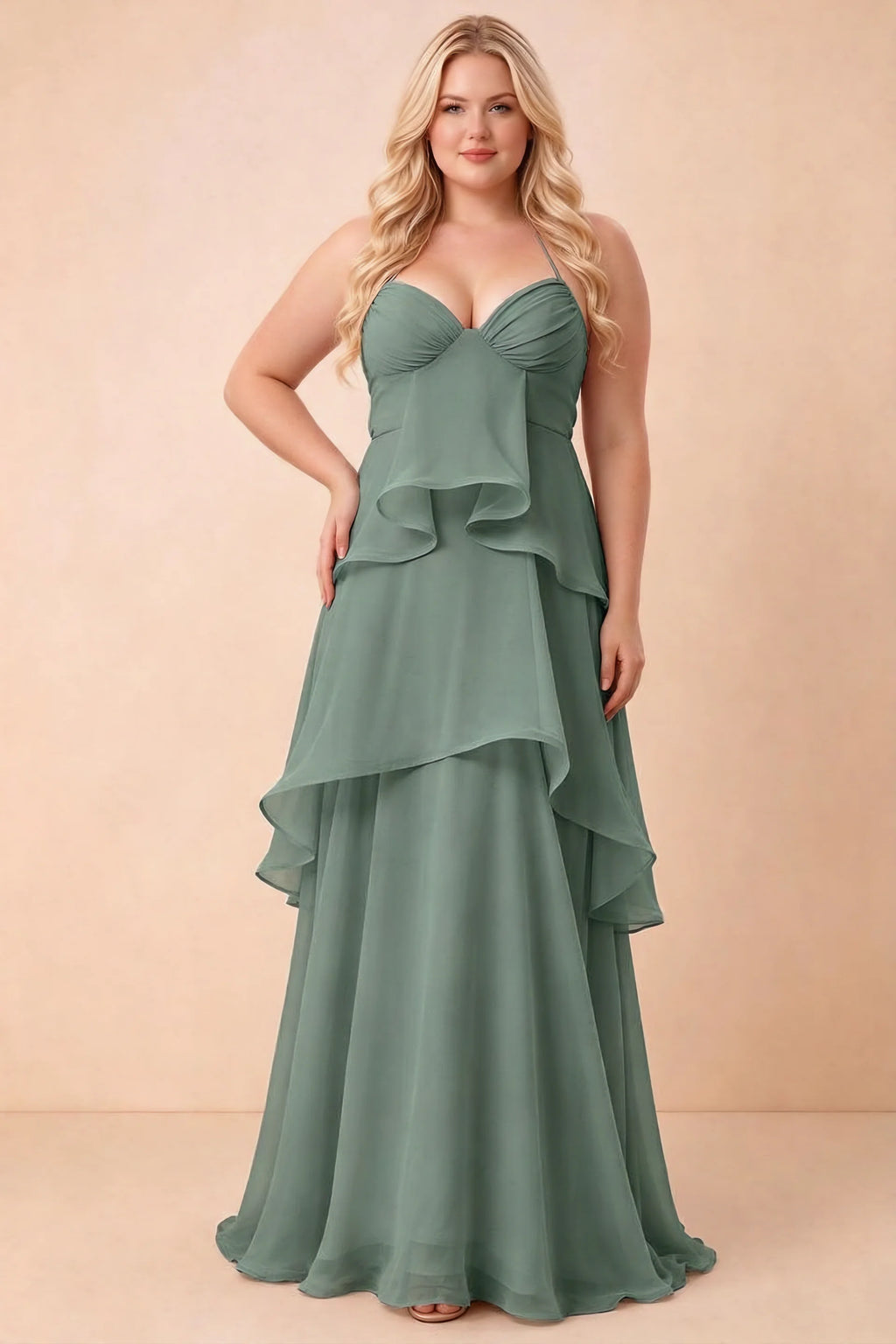 Front studio view of Candace eucalyptus dress on a second model, showing the gathered bust and broad ruffles