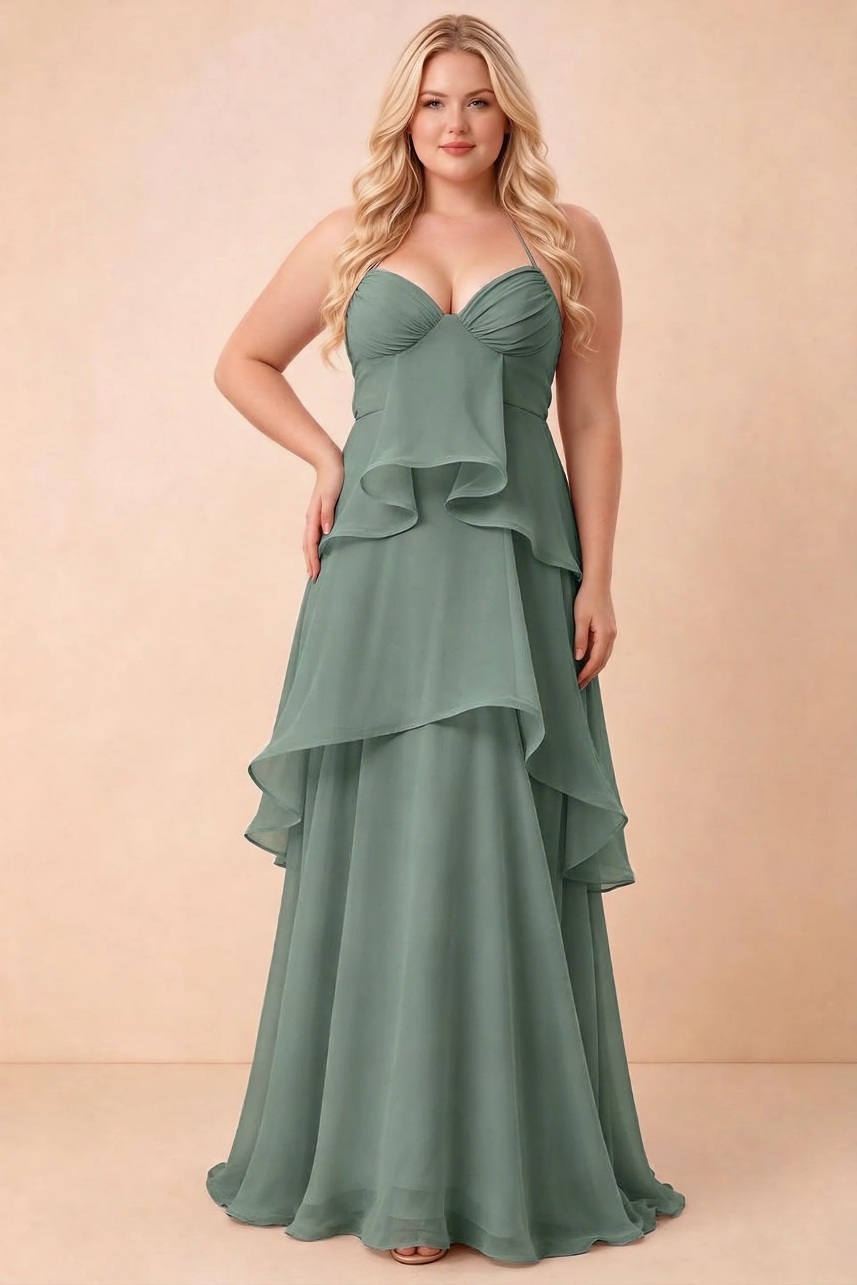 Front studio view of Candace eucalyptus dress on a second model, showing the gathered bust and broad ruffles