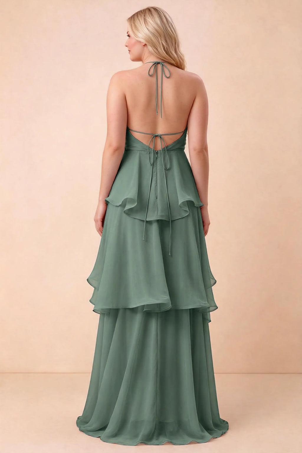Rear studio view of Candace eucalyptus dress on a second model, showing the open back and long hem