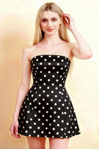 LVLVS Candice black polka dot crepe dress front flat lay style view highlighting fabric texture and asymmetric hem for semi-formal party