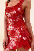 Close up detail of LVLVS Caroline red sequin fabric texture, showcasing high quality material for party season