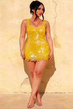 Plus size model wearing LVLVS Caroline yellow sequin bodycon mini dress with square neckline for prom