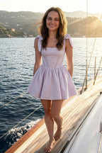 Customer in LVLVS Cassandra Lavender Bow Straps Mini Skater Dress on Yacht | Stretch Crepe Summer Party Cocktail Wear with Square Neckline