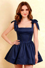 Close Up of LVLVS Cassandra Navy Square Neckline Dress with Big Bow Straps for Prom and Semi-Formal Occasions