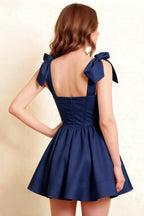 LVLVS Cassandra Navy Crepe Dress Detail Shot Showing Back Cutout and Bow Ties for Wedding Guest